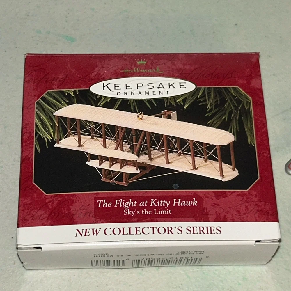 2 Hallmark Ornaments 1999 Sky's the Limit Airplane 1997 The Flight At Kitty Hawk